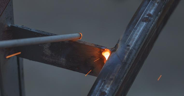 welding rod and glowing hot metal