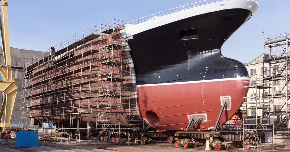 ship in shipyard under construction - stud welding